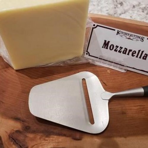 Fresh Cut Mozzarella Cheese - per lb Fresh Cut Mozzarella Cheese - per lb